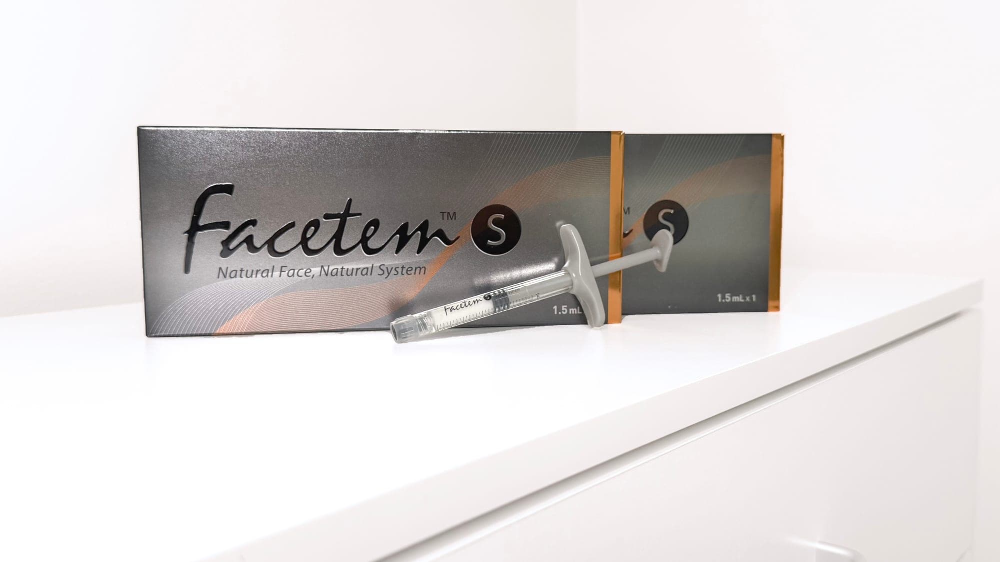 Facetem packaging and syringe.