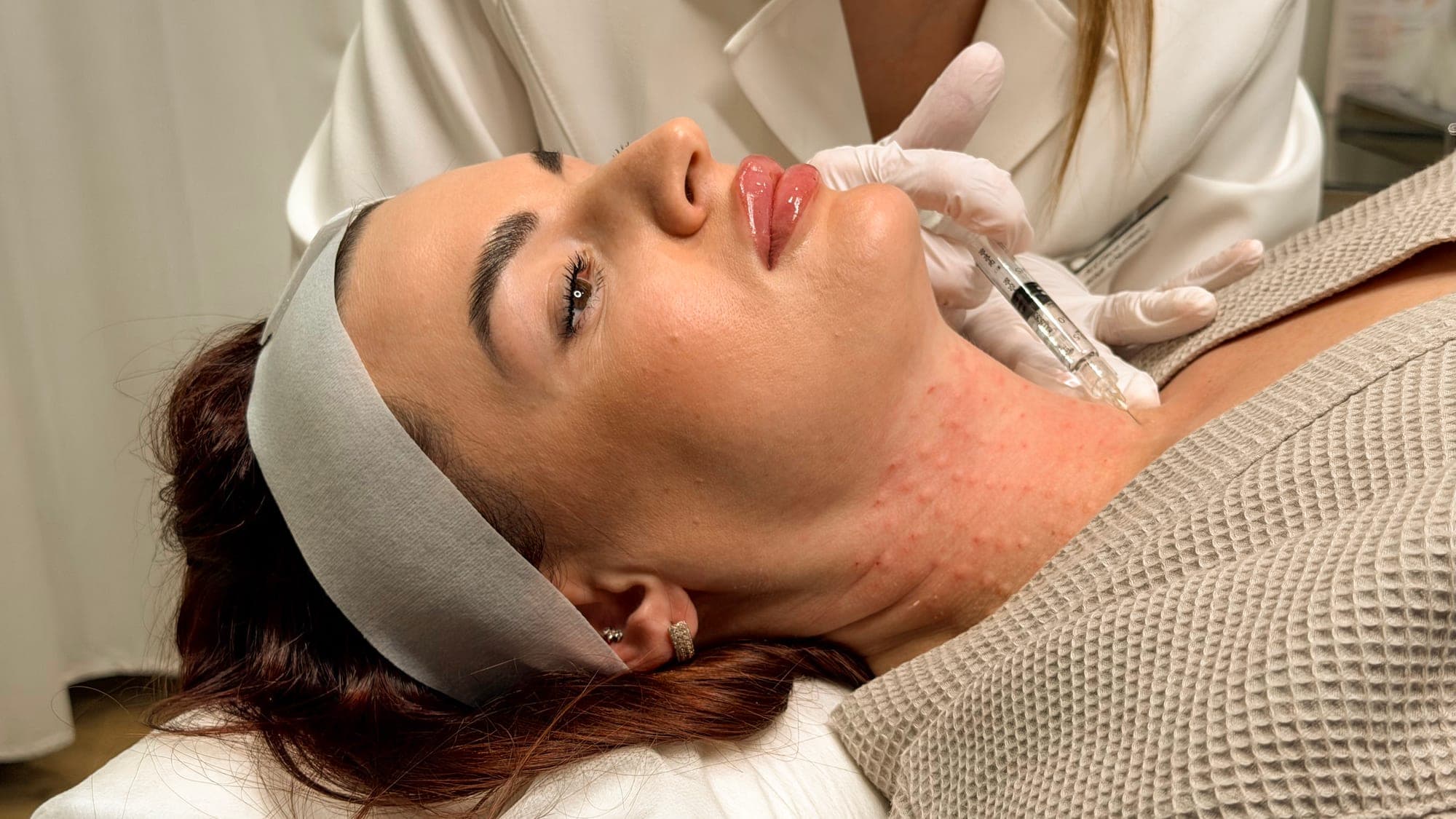 Oxana performing neck mesotherapy.